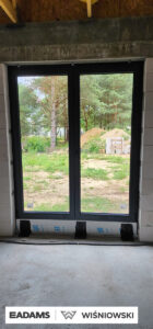 Brama garażowa UniTherm, okna PVC PRIMO 82, rolety Protecta P