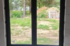 Brama garażowa UniTherm, okna PVC PRIMO 82, rolety Protecta P