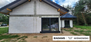 Brama garażowa UniTherm, okna PVC PRIMO 82, rolety Protecta P