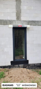 Brama garażowa UniTherm, okna PVC PRIMO 82, rolety Protecta P