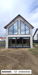 Okna PVC PRIMO 82, brama segmentowa UniTherm, rolety zewnętrzne