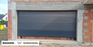 Okna PVC PRIMO 82, brama segmentowa UniTherm, rolety zewnętrzne