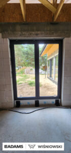 Brama garażowa UniTherm, okna PVC PRIMO 82, rolety Protecta P