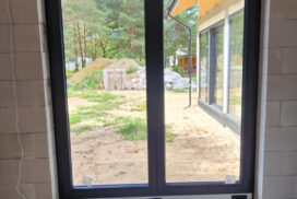 Brama garażowa UniTherm, okna PVC PRIMO 82, rolety Protecta P