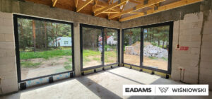 Brama garażowa UniTherm, okna PVC PRIMO 82, rolety Protecta P