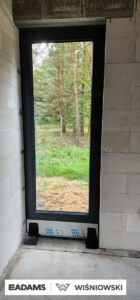 Brama garażowa UniTherm, okna PVC PRIMO 82, rolety Protecta P