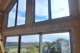 Okna PVC PRIMO 82, brama segmentowa UniTherm, rolety zewnętrzne