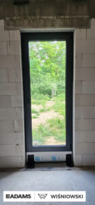 Brama garażowa UniTherm, okna PVC PRIMO 82, rolety Protecta P